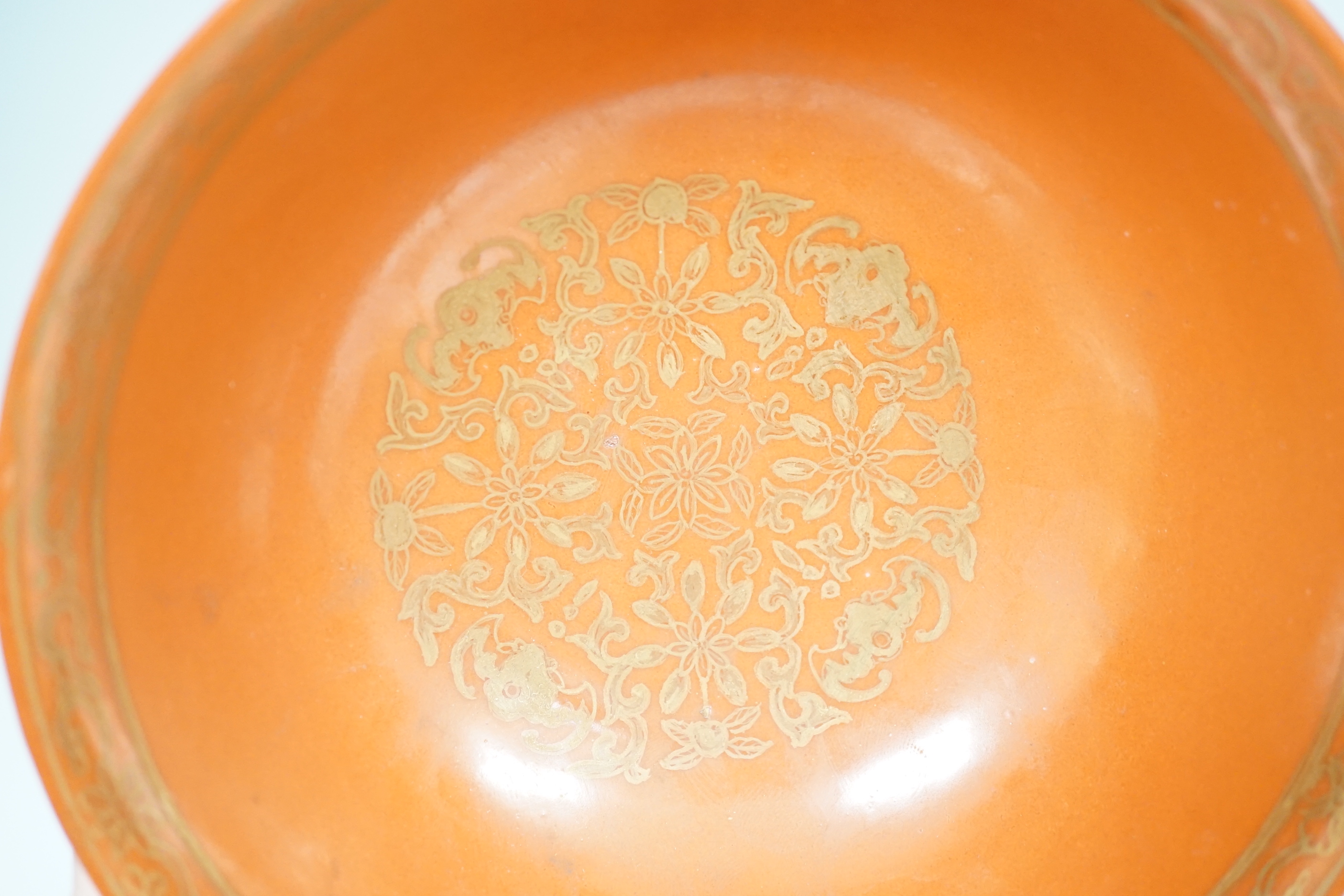 A Chinese gilded coral-ground bowl, 17cm diameter